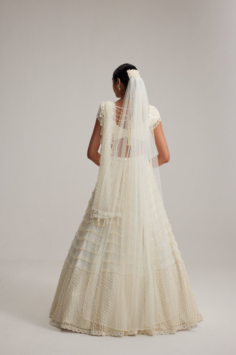 Off White Mirror and Pearl Drop Bridal lehenga set with Veil