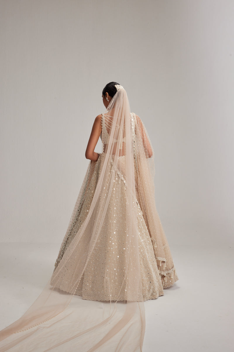 Light Beige Dense mirror and pearl lehenga set with Double Dupatta and Veil