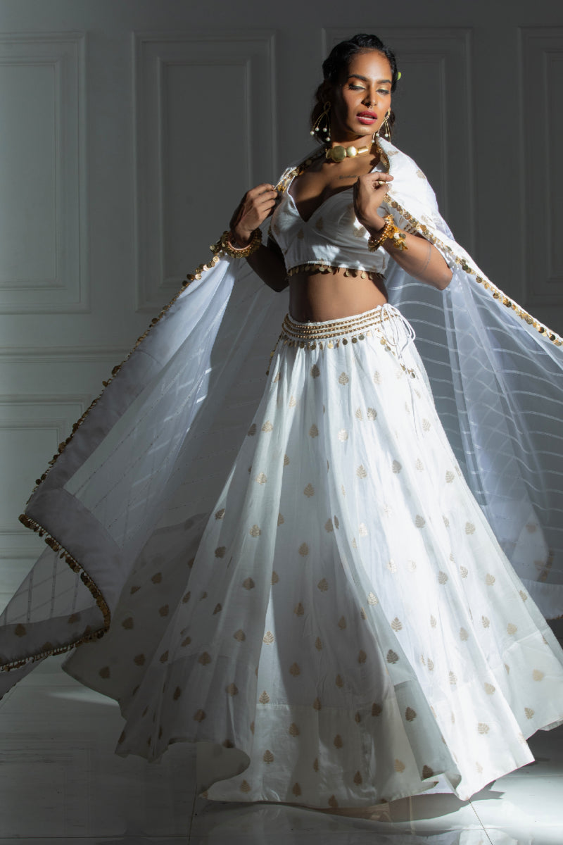 White silk blend Lehenga with coin detailing blouse and dupatta