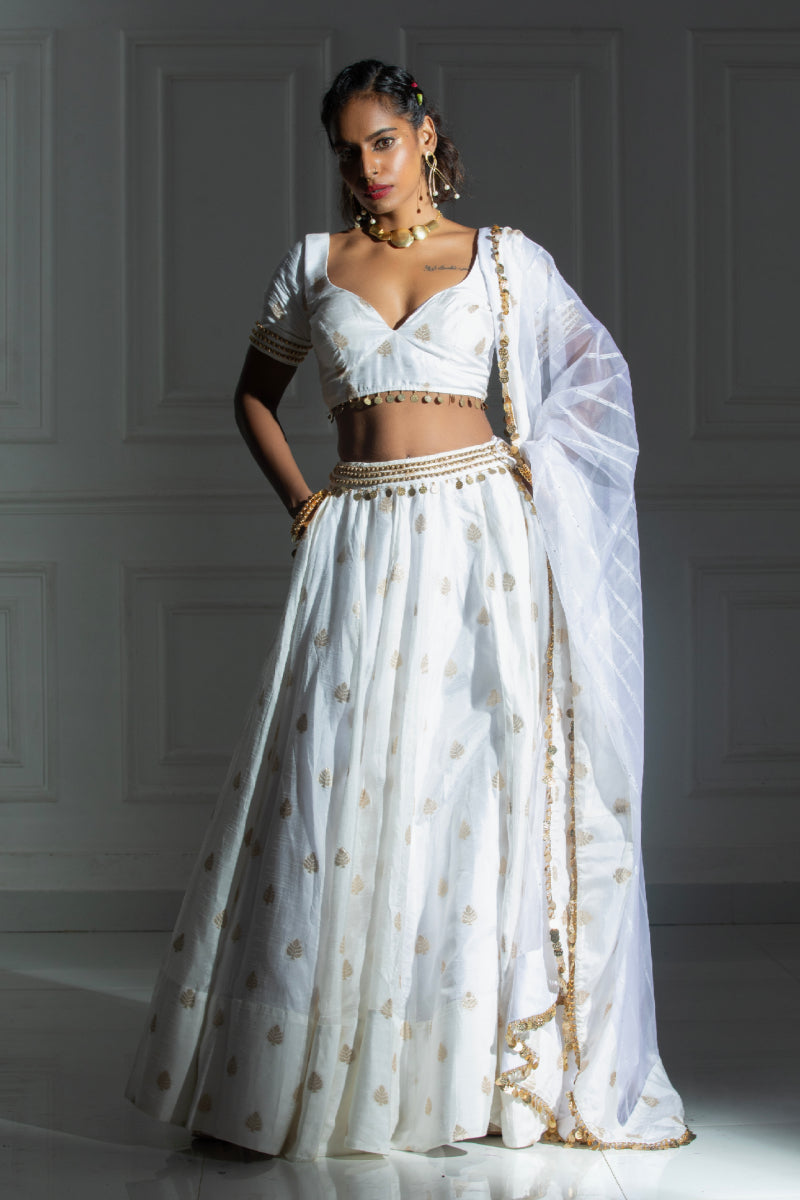 White silk blend Lehenga with coin detailing blouse and dupatta