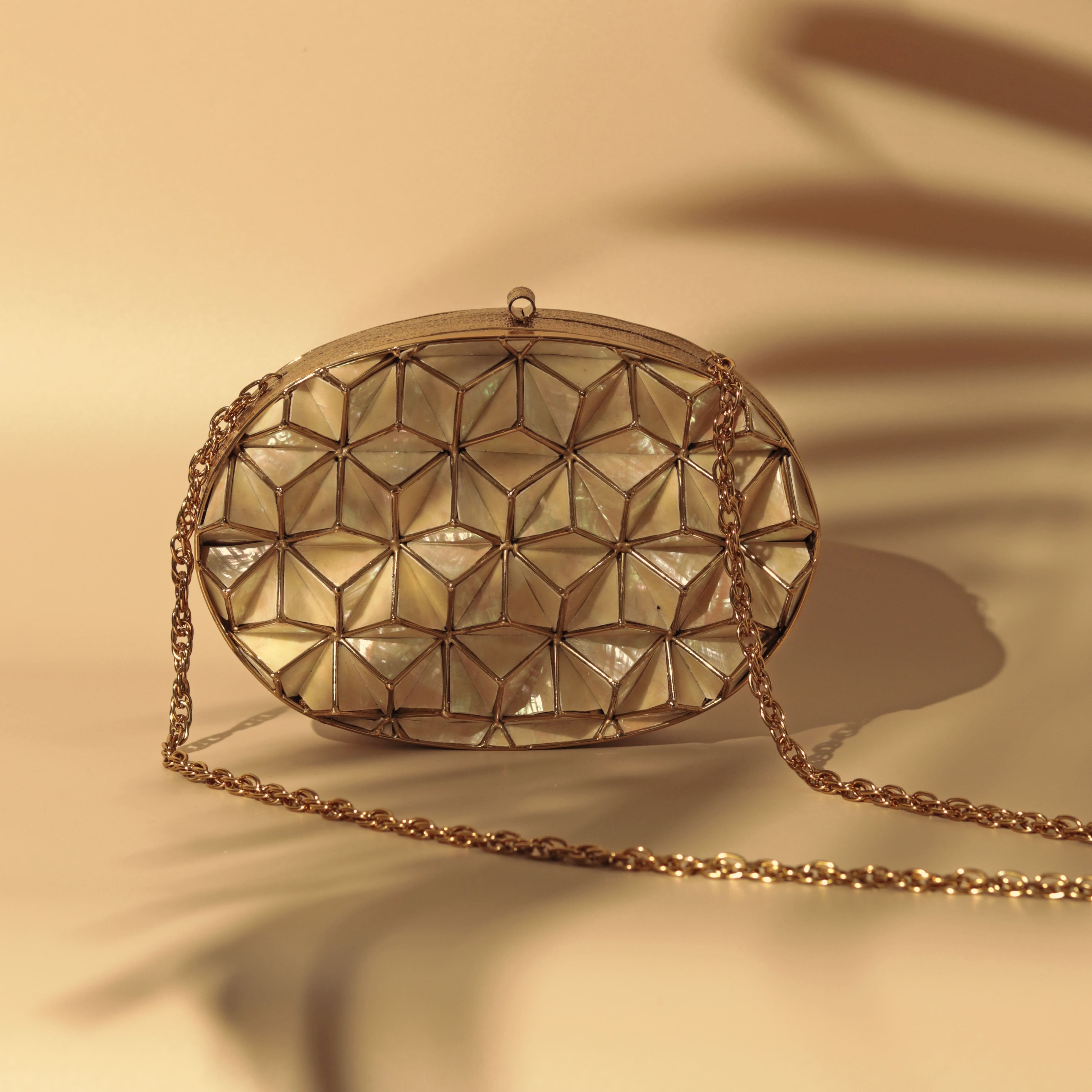THE TAN CLAN Maya 3D Mother of Pearl Clutch