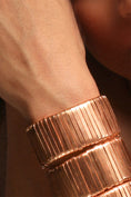 Load image into Gallery viewer, Galactic Shield Gold Ribbon Cuff Bracelet
