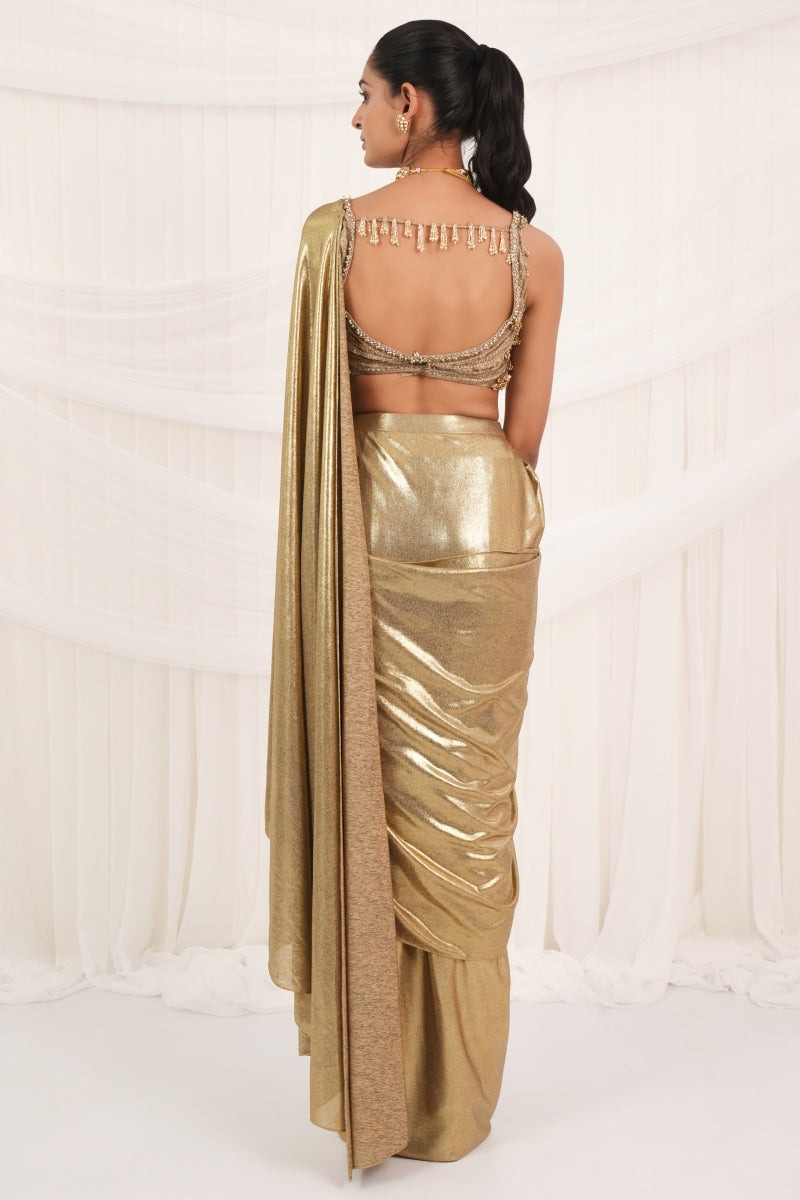 Gold Knotted Saree With Pearl Blouse