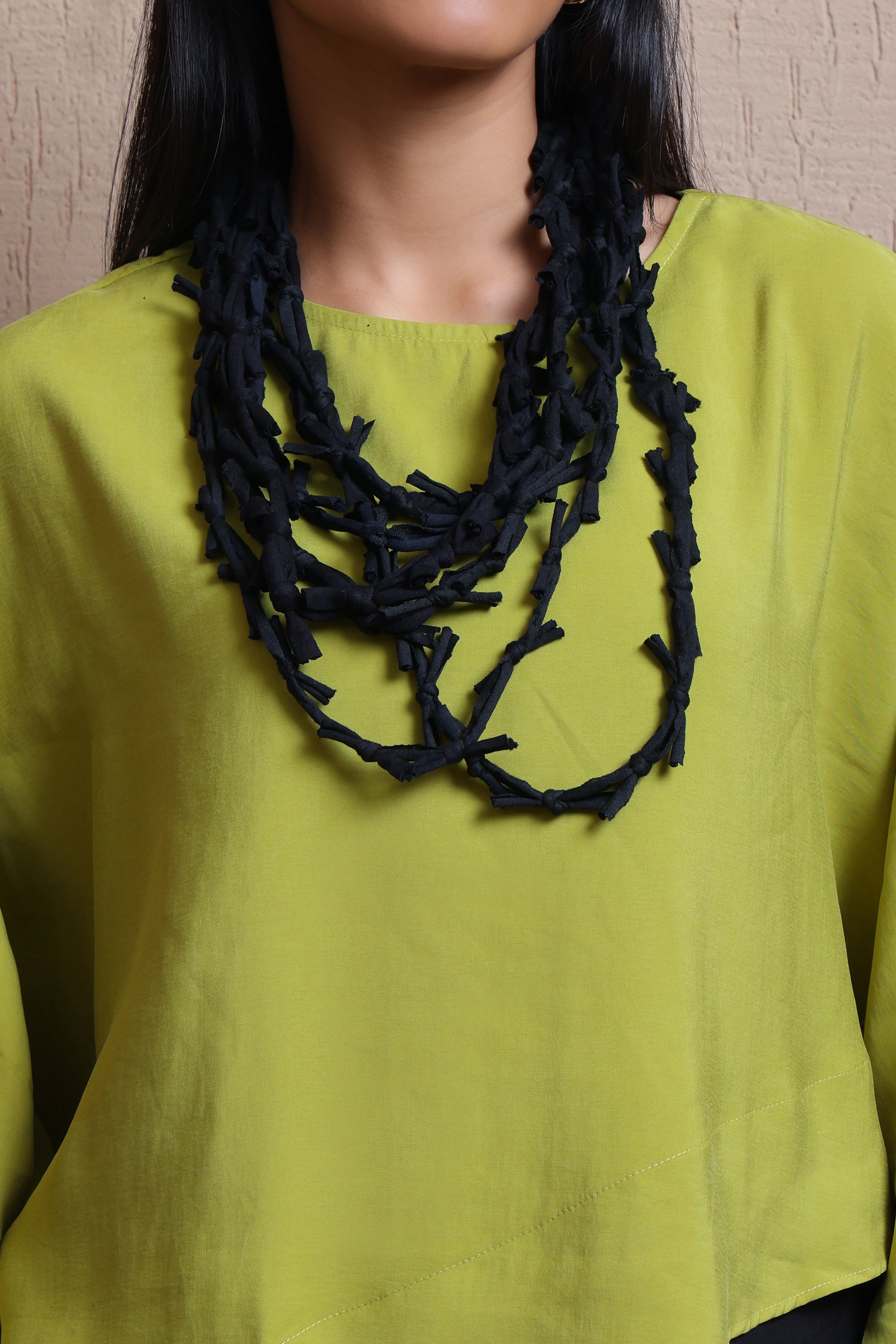 Asymmetric layered top  -  Meiala