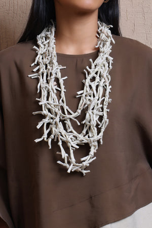 Asymmetric layered top  -  Meiala