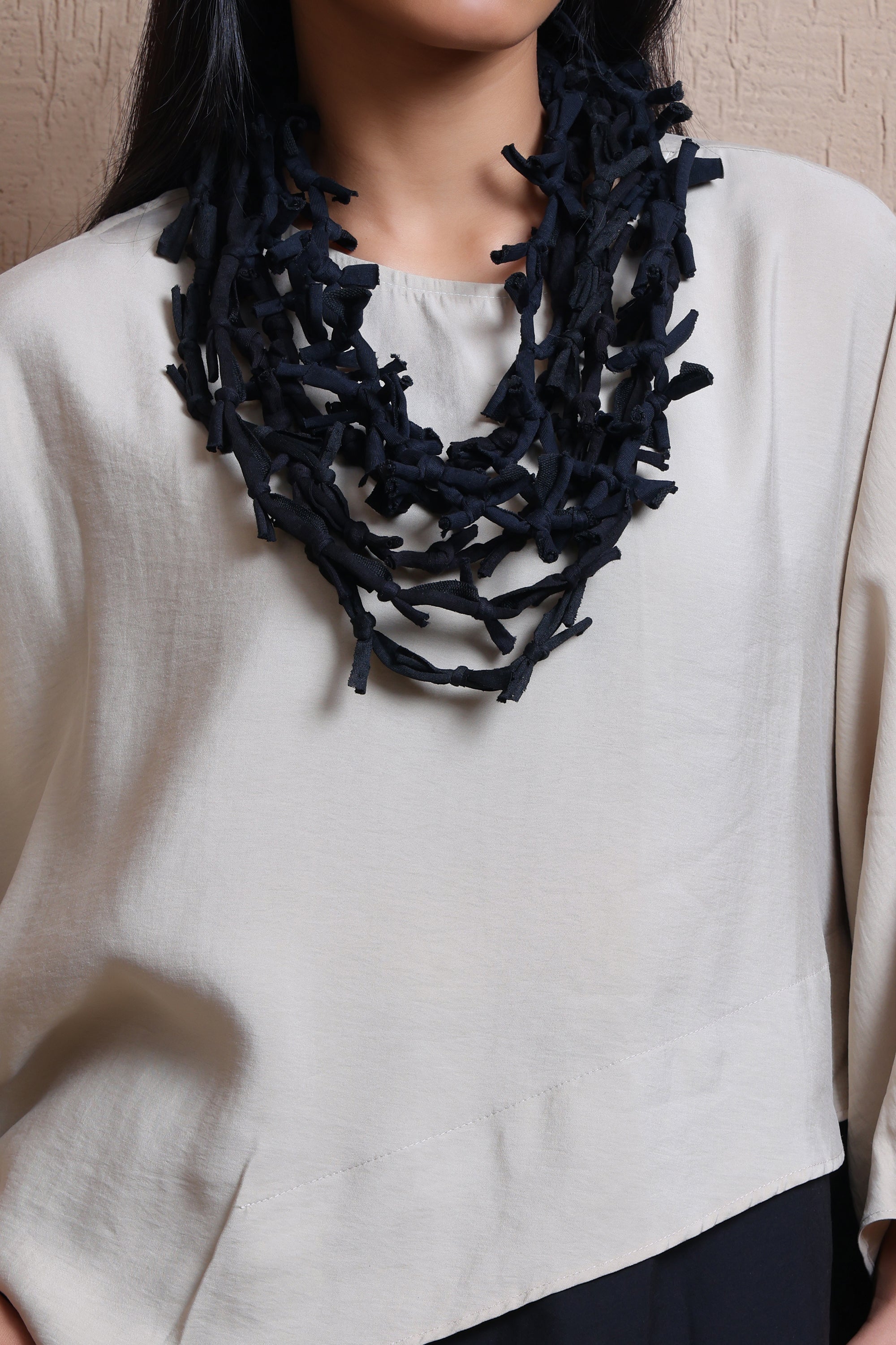 Asymmetric layered top  -  Meiala