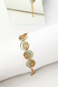 Load image into Gallery viewer, Gold Toned Cyan Acrylic Tangent Choker With Inlaid Dotted Circles
